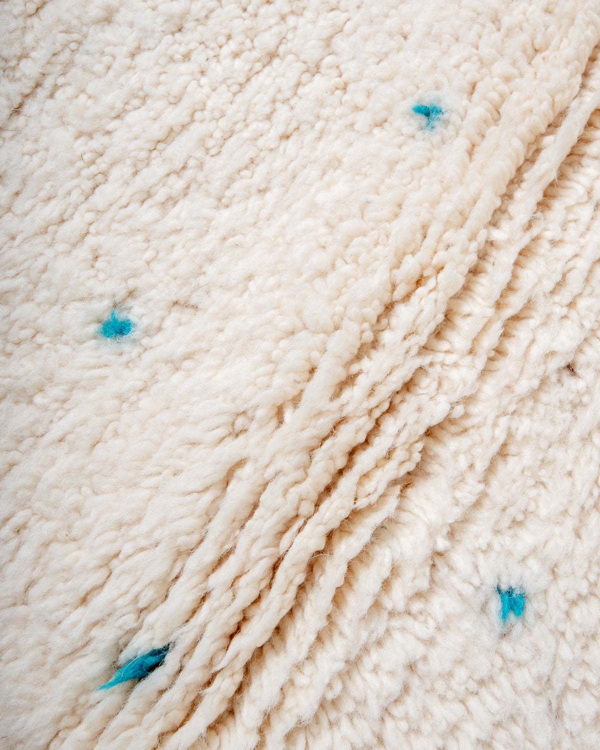 Modern, designer, handcrafted Berber rug from Morocco. Beniourain carpet with beautiful colours and patterns and fluffy wool texture.